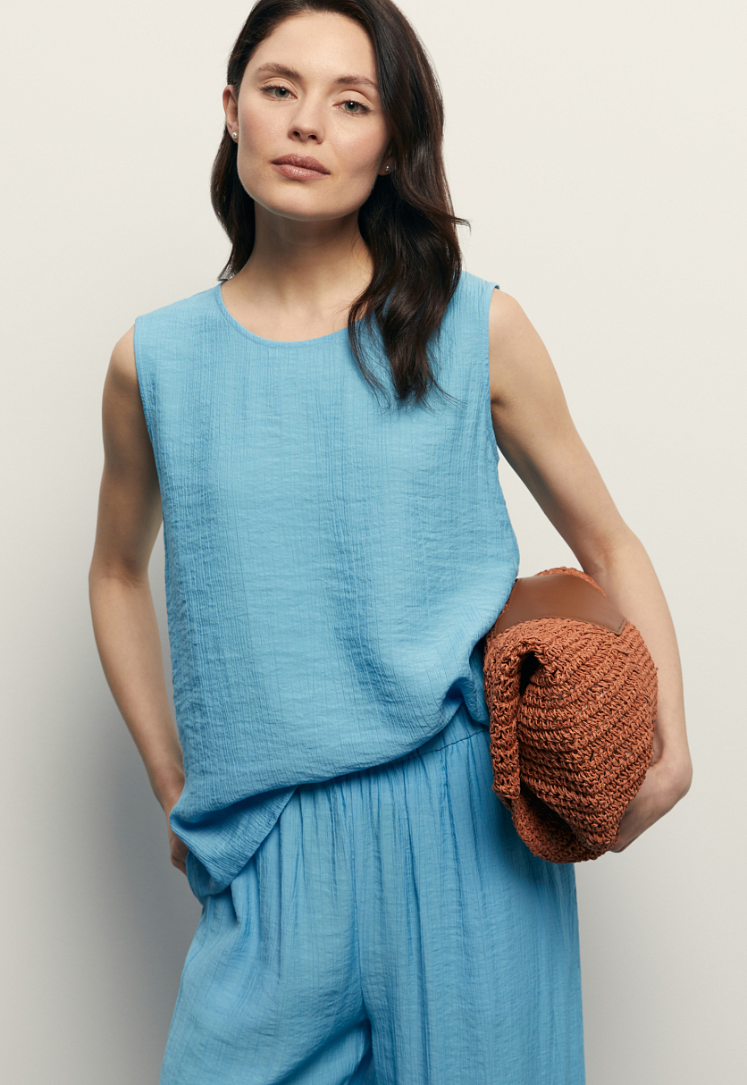 Блузка без рукавов свободного кроя