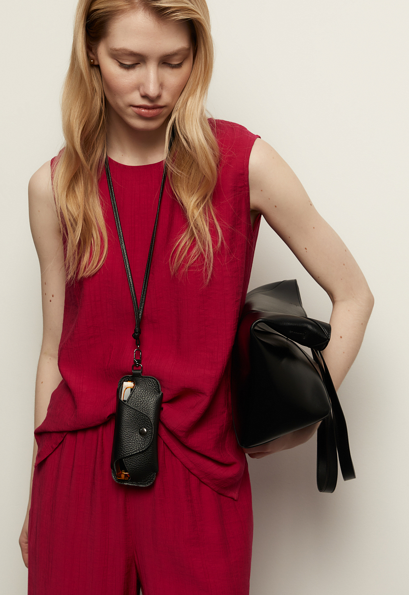 Блузка без рукавов свободного кроя